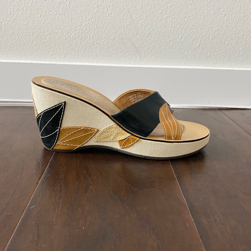 Indigo wedge heels with embroidered heel.